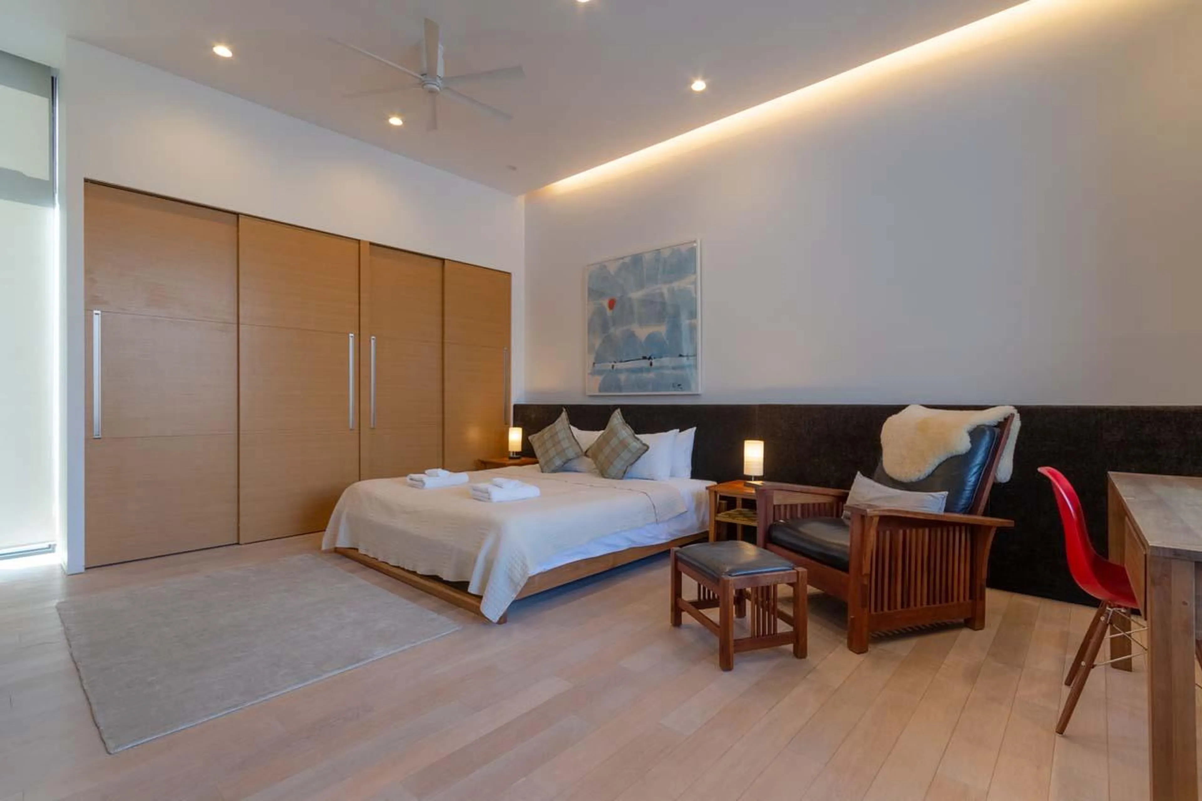 Spacious bedroom with plentiful storage space at Yanagi House in Niseko