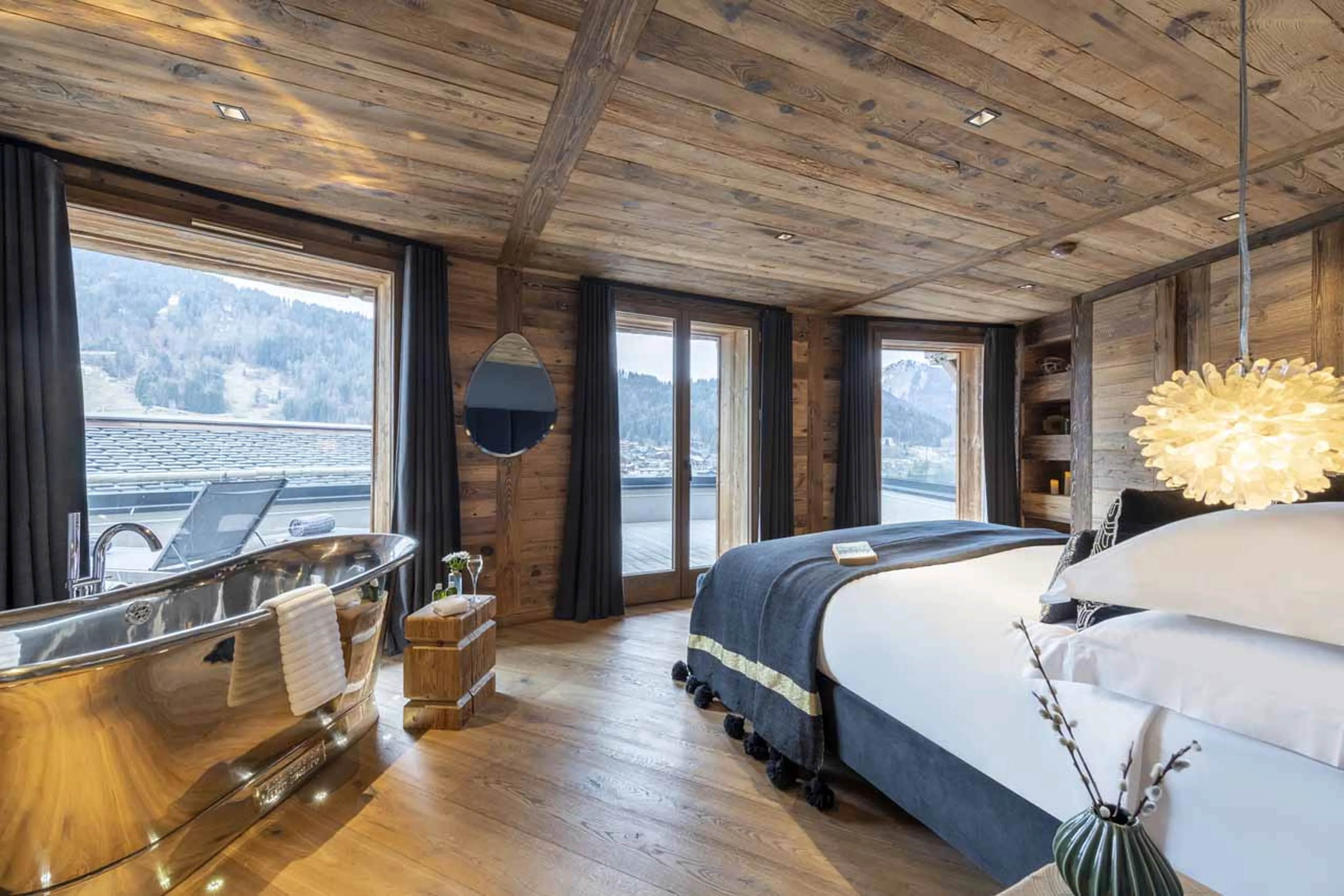 Freestanding nickel bathtub at ZEMS Lodge in Morzine