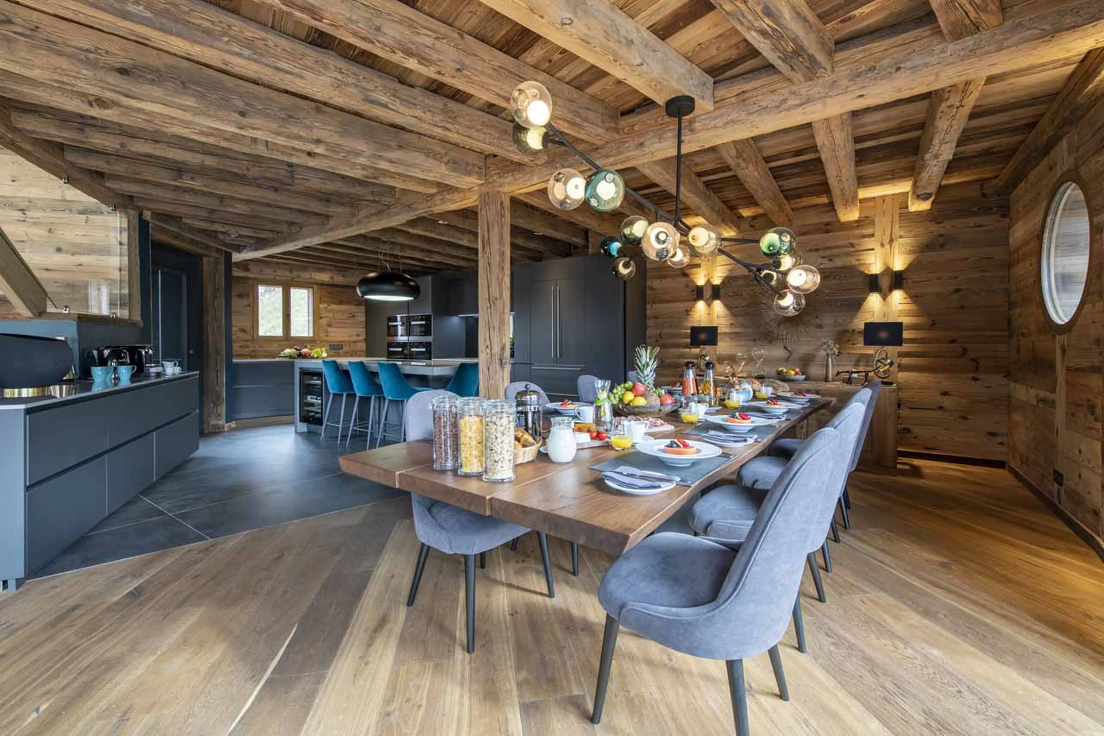 Dining area and kitchen at ZEMS Lodge in Morzine